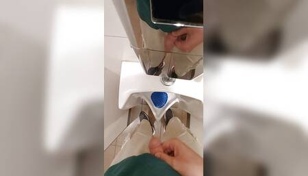 Taking a Piss at a Urinal