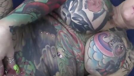 Full body tattooed milf gets fucked hard
