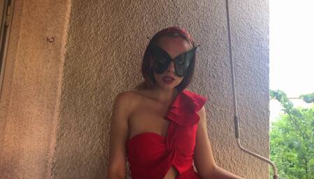 Elegant babe gives risky blowjob on balcony