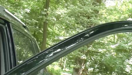 Horny gilf with small tits gets fucked in the back of her car