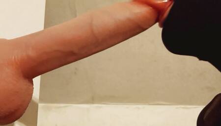 Sissy sucks two dildos