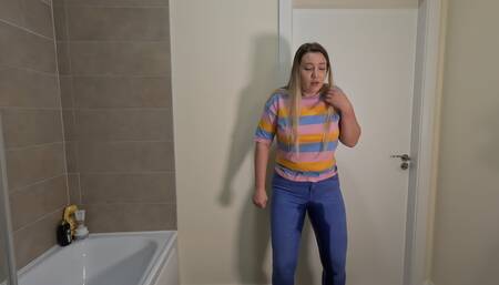 Locked in the bathroom with full bladder and pee in jeans