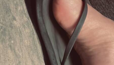 Flooring and revving in black flip flops