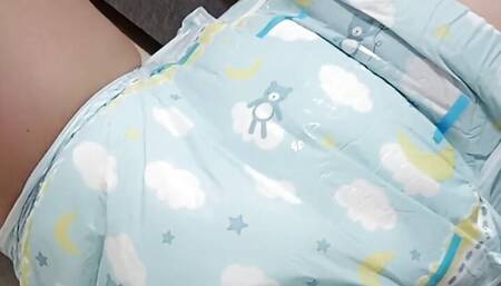 Putting my DIAPER on for daddy. ALL ALONE!