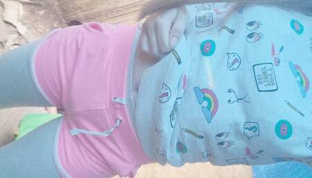 Outside desperate for a wee Tinylittlebabyg is cornered into soaking her medical pull up