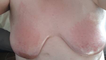 Disobedient fat bitch has to spank her oiled saggy tits as punishment