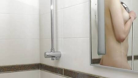 Sweet brunette Vika Lita passionately masturbates in the bathroom in 4K.