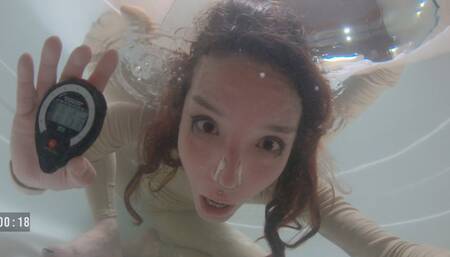 Sattira underwater apnea practice with stopwatch