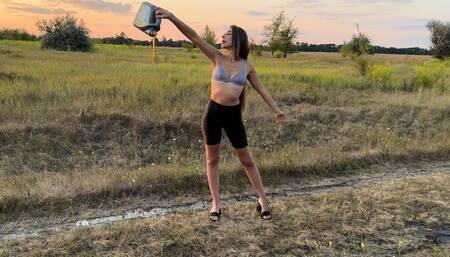 Pours motor oil onto the ground (custom video)