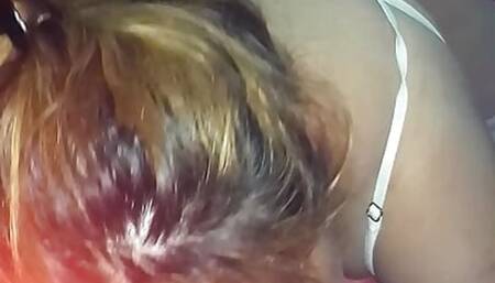 Girl in bun and white outfit is as a puppy