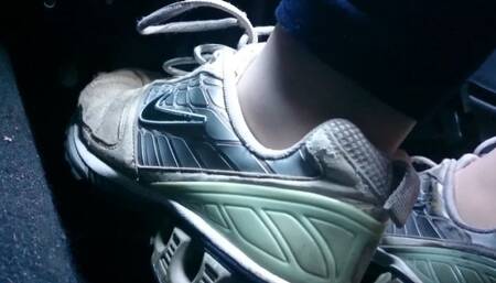 Driving on the coast in worn and broken Nike 720HD