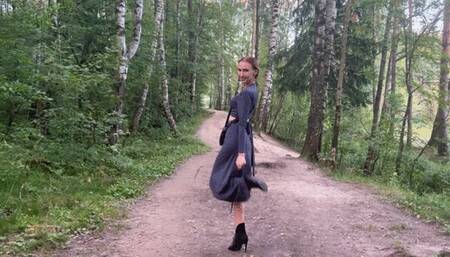 The girl in the shoe Walking in high heels through the woods and looking for dirt where she could crush her shoes, she finally found the dirt