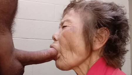 Japanese Granny Sucks White Cock in A Restroom