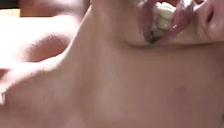 During DP, a Raunchy Brunette Grins and Swallows Hot Come From the Two Lustful Guys.