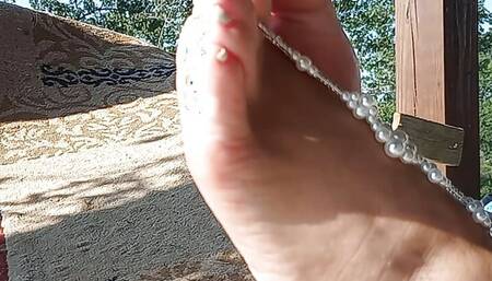 Candidly filming my girlfriends' feet while she sits back