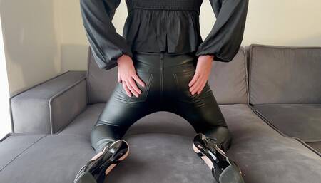 Twerking in skinny leather pants and 7-inch heels.