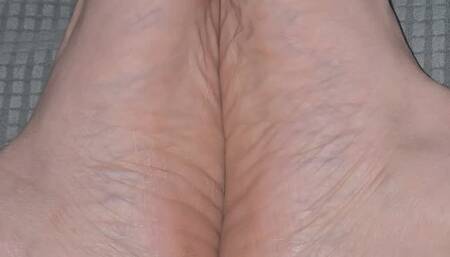 Big feet soles together