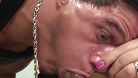 Gorgeous blonde shemale with high heels gives a blowjob to