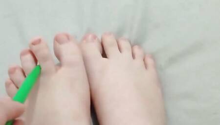 I touch my feet with my boss's pencil