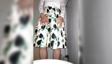 Urine and Sperm Flow Wetting the Satin Skirt of a Crossdresser