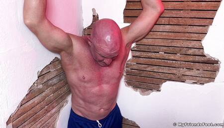 Stand up Dev tries resisting tickling while bondaged