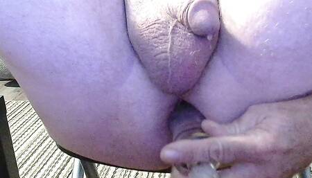 close up, glass dildo causing precum to flow
