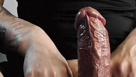 Sporty guy jerking off his big fat cock in saliva