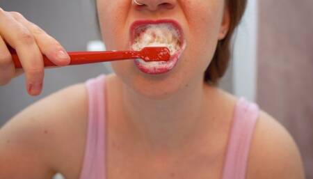 BRUSHING AND FLOSSING TEETH