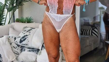 OILING UP AND POSING ON THE COUCH