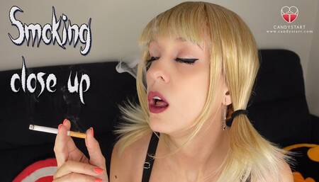 Blonde smoking close up