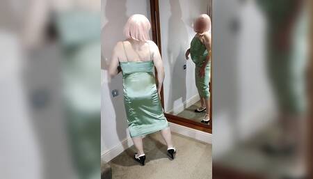 Hot crossdresser in green satin dress