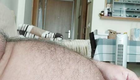 Fat hairy guy jerking off and cumming on himself