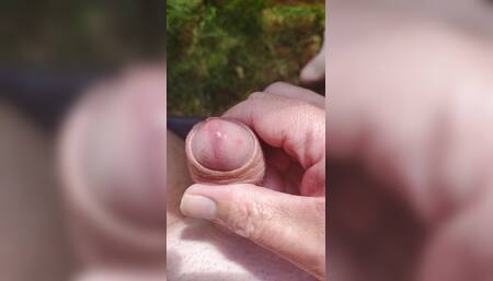 Playing wetly with my soft cock