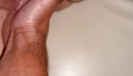 Horny girl squirts during fingering her tight pussy