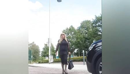 Crossdresser in transparent dress and sexy underwear outdoor