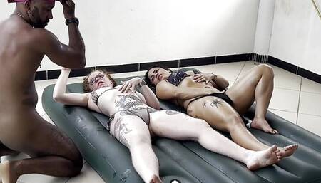 two hot girls don't know how to inflate the inflatable mattress and ask a man for help