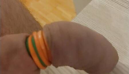 Cumming with limp cock banded with 10 bands