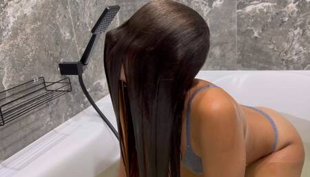 Wet hair sticks to face (fragment of custom video)