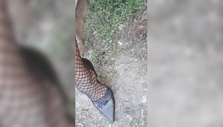 small dick and pretty dress latina femboy peeing outdoors