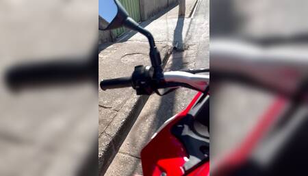 Big dick 23cm soft in shorts without underwear taking a motorcycle ride on the street