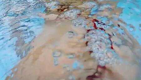 Lana Tanga toys herself underwater