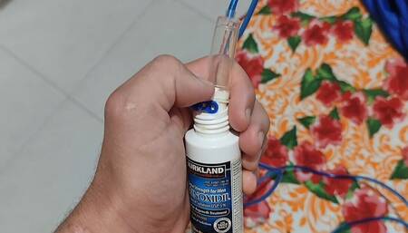 To Greatly Enlarge the Penis, the Young Straight Man Applies Minoxidil Directly to the Glans