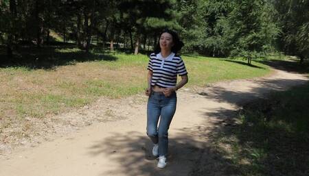 A Chinese girl was tied to a tree while running and her belly button was tickled