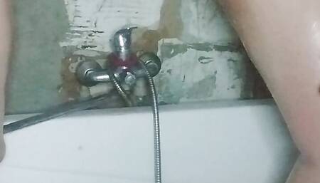 Camera in the bathroom, and a girl with a big ass is peeing, very sexy