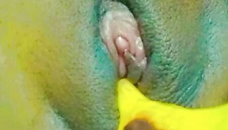 Massaging my pussy with big banana