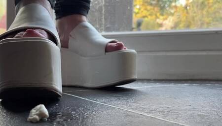 Chewing gum and spit on white platform wedge heels, two clips really left and right foot