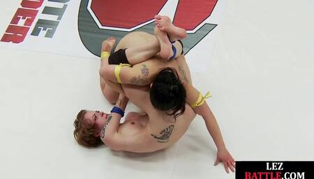 Lesbian amateur 3some wrestling on mat between hot dykes