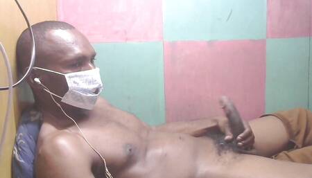Masturbating Using a White Mask