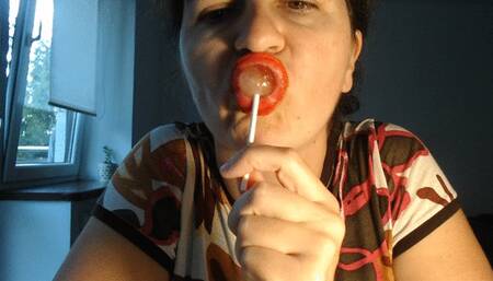 Cherry lollipop and red lips