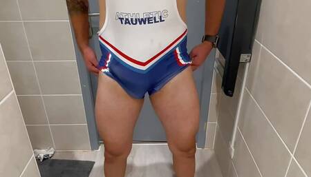 Cocky jock masturbating in his wrestling singlet leotard